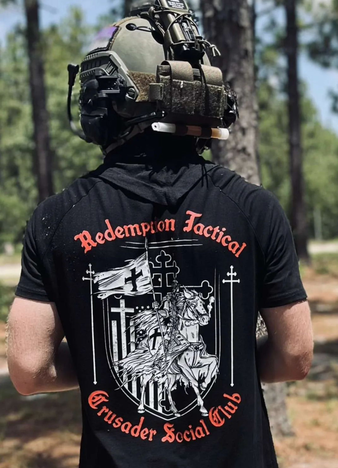 redemption tactical Lifestyle view of the fitted Black Crusader Social Club T-Shirt with Christian symbolism, by Green Tip Surplus. Free shipping on $50+ U.S. orders. Black tactical graphic tee with Redemption Tactical front branding and Crusader Social Club logo