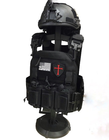 Armor Butler Stand 2.0 by Green Tip Surplus, designed to hold and display tactical body armor, helmets, and battle belts. This heavy-duty stand supports fully kitted-out armor and can be customized in various configurations. Available in black and coyote brown.