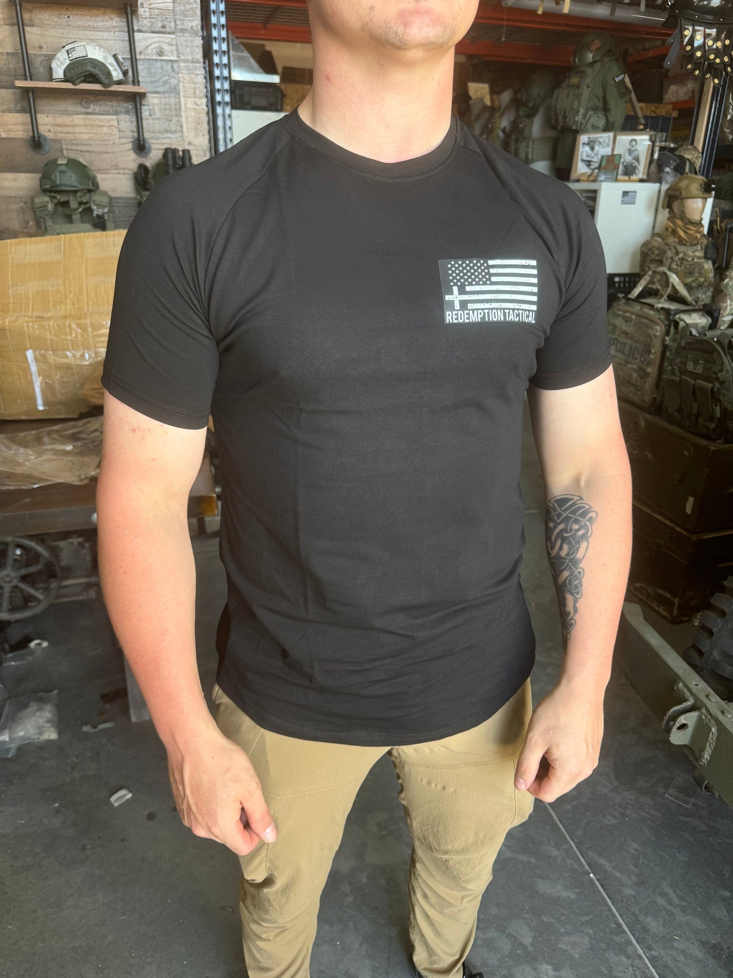 Green Tip Surplus Redemption Tactical Crusader Glory T-Shirt with moisture-wicking fabric. Features include a bold 'Crusader Glory to God' design on the back, Redemption Tactical logo on the chest, and a Crusader Christian flag on the sleeve