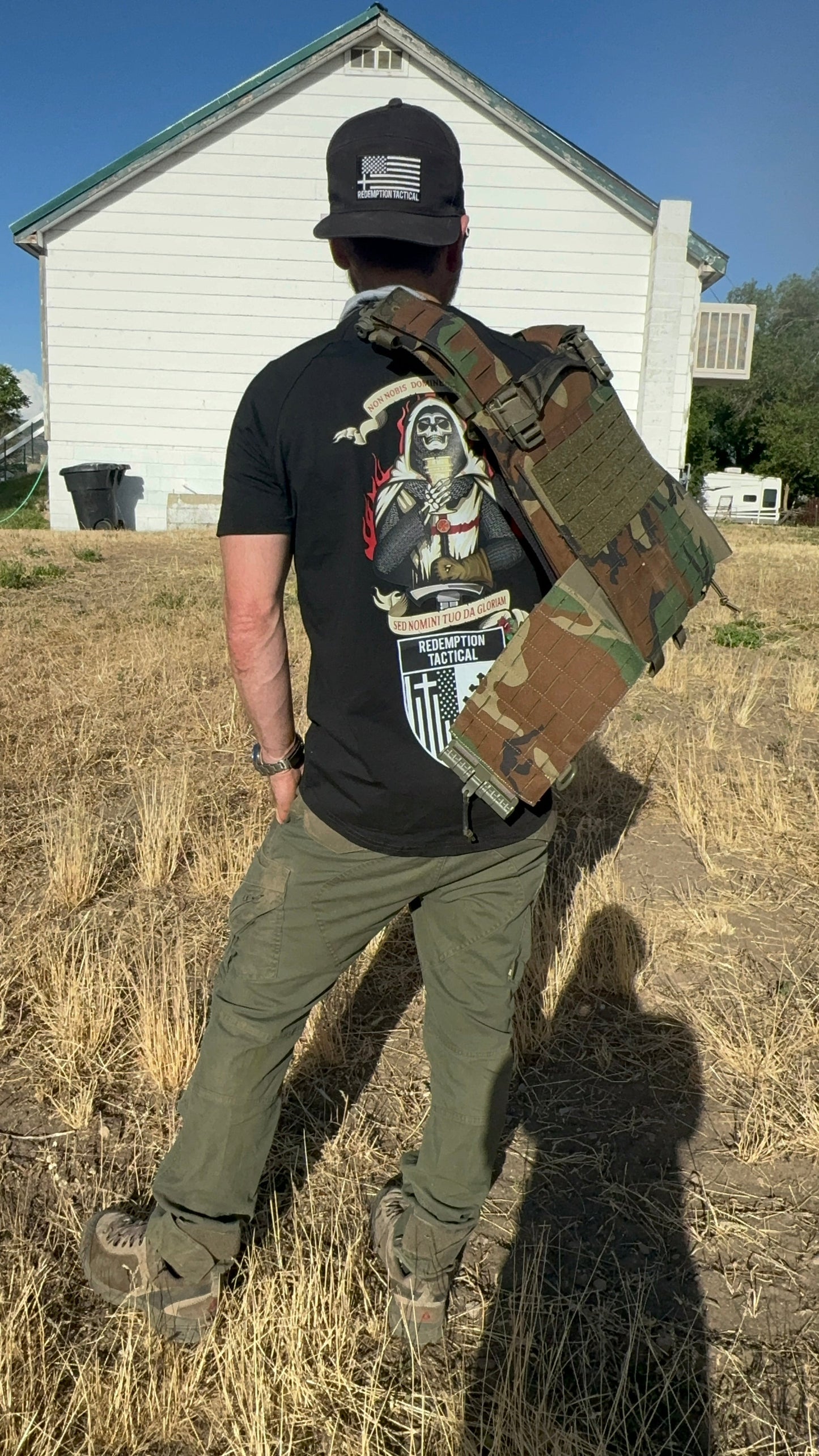 Redemption Tactical Crusader Glory T-Shirt featuring a stretchy, moisture-wicking fabric. The shirt showcases a bold 'Crusader Glory to God' graphic on the back and the Redemption Tactical logo on the front. A Crusader Christian flag design is displayed on the left sleeve. green tip surplus