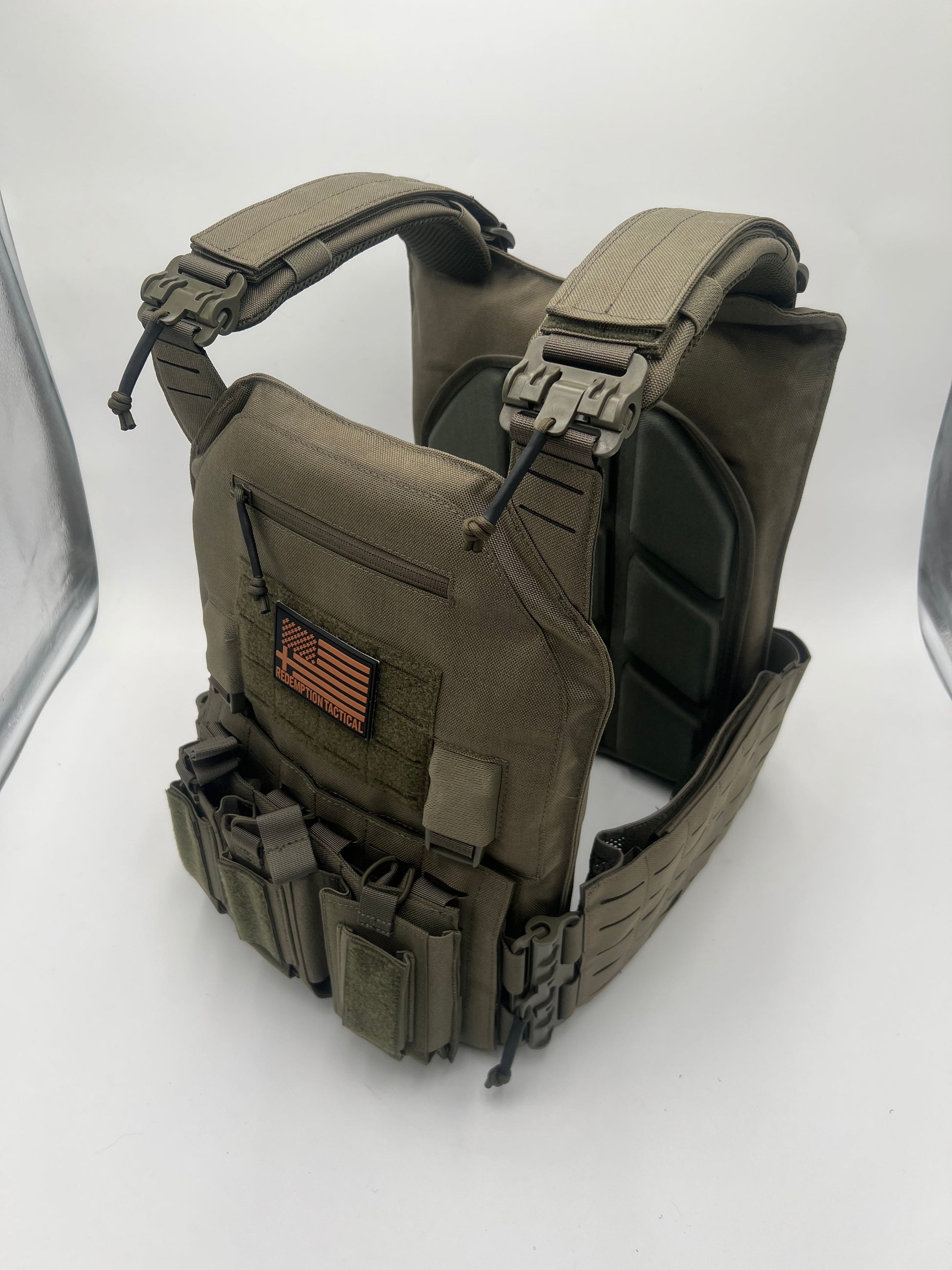 View of the Green CRUSADER 2.0 XL Plate Carrier by Green Tip Surplus, featuring front and back pouches designed to securely hold 10x13.5 XL and 11x14 XXL ballistic plates for enhanced protection during tactical operations