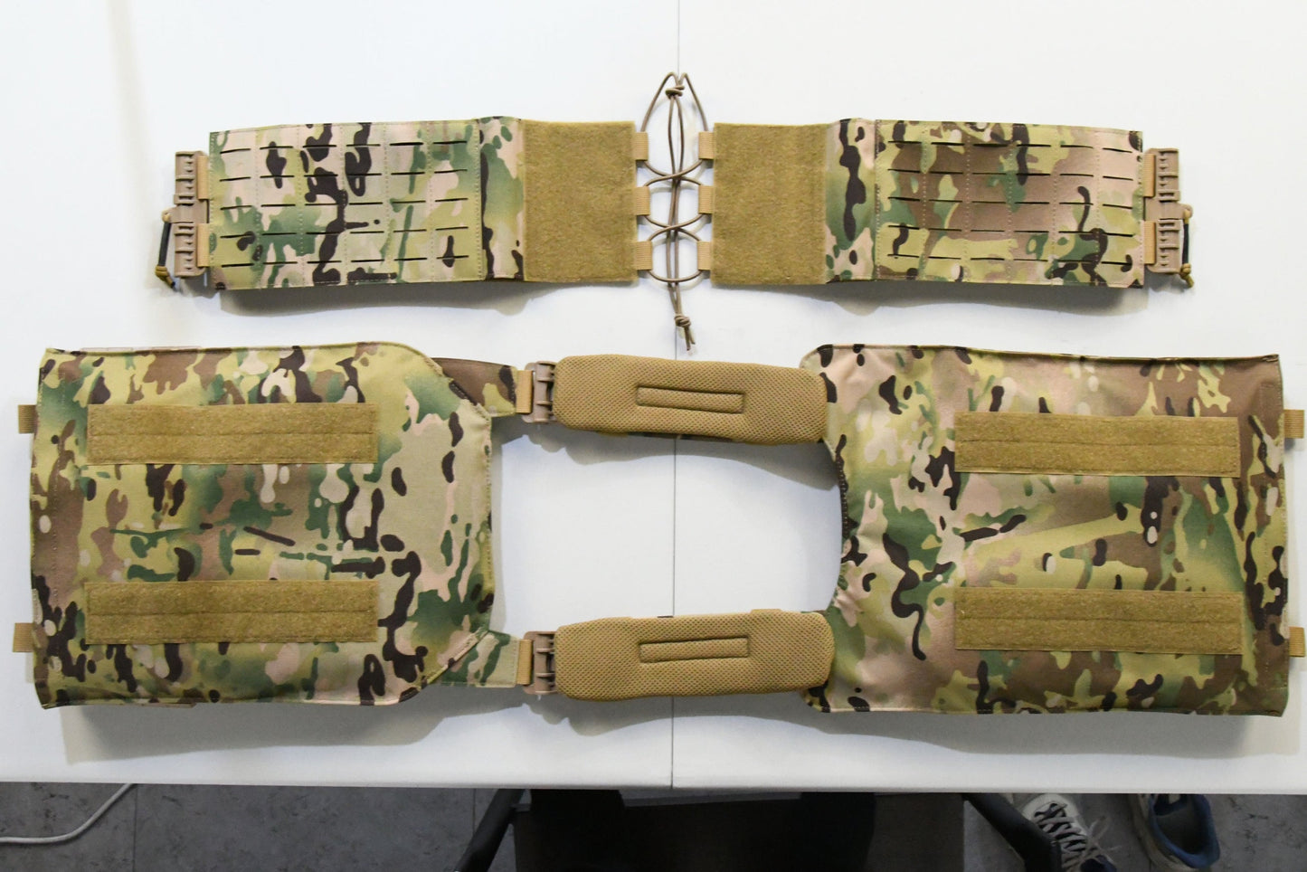 Front view of the CRUSADER 2.0 XL Plate Carrier featuring the triple double stack mag pouch, holding 3 AR mags and 3 pistol mags, attached with secure buckles.