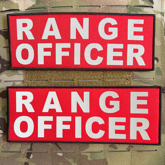 Pair of RANGE OFFICER reflective patches (3” x 8”) with hook and loop backing for easy attachment to tactical vests or gear, designed for night-time visibility